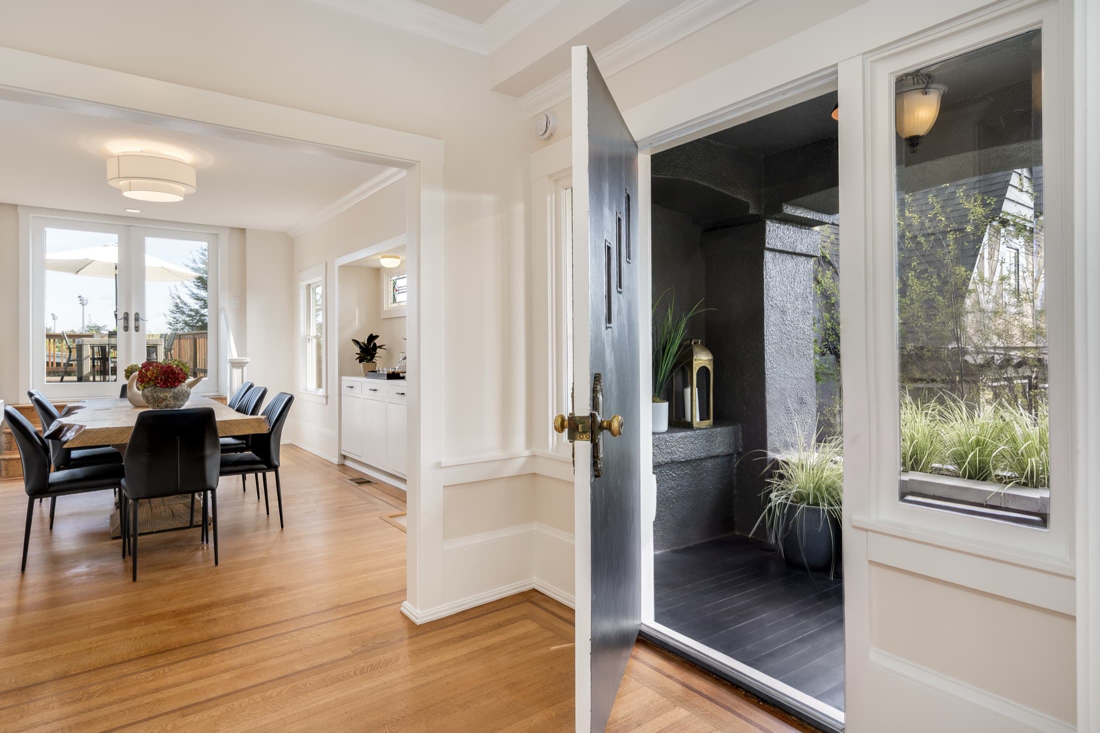 The entry hall, looking through to the dining room.