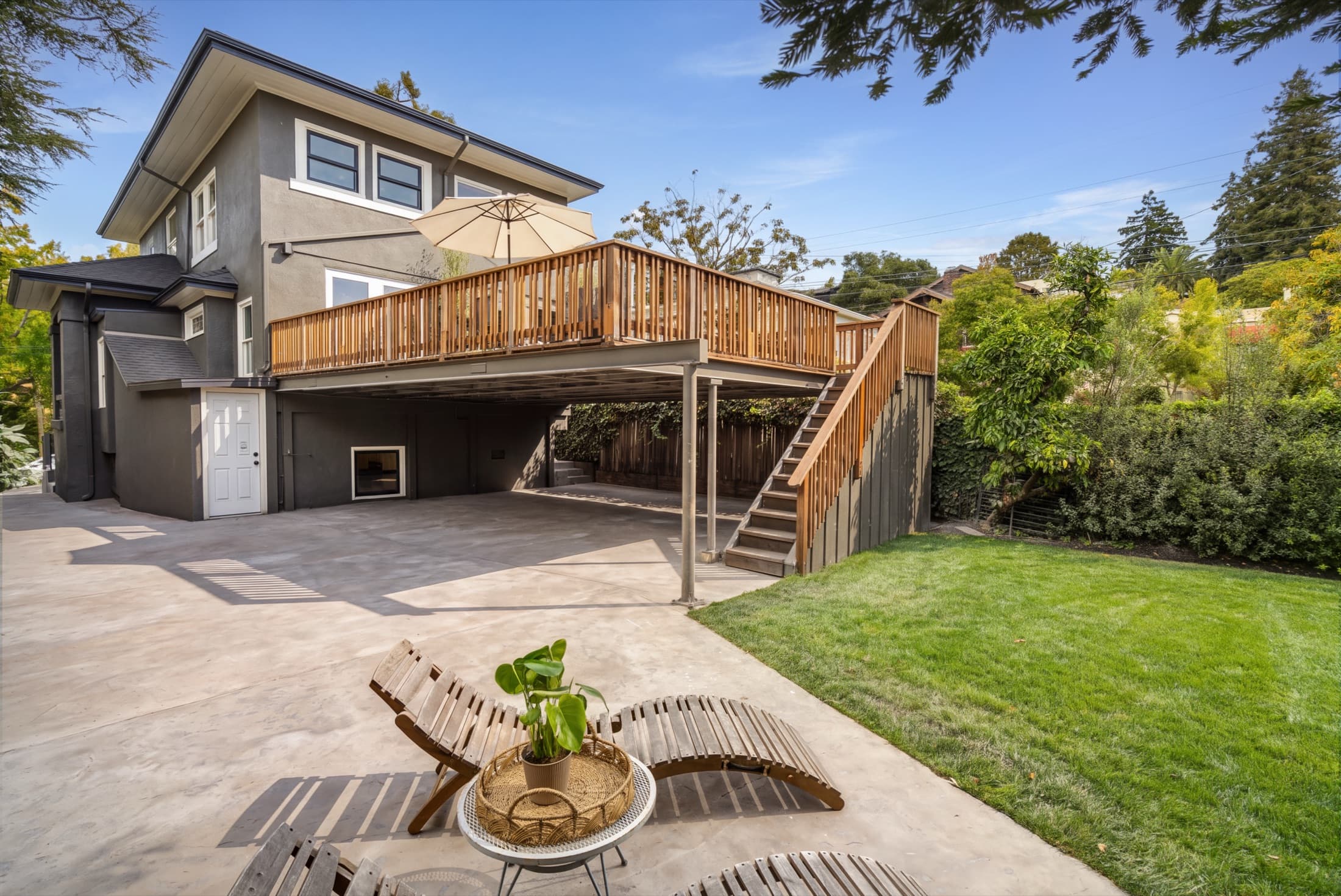 The rear of the house and lower patio.